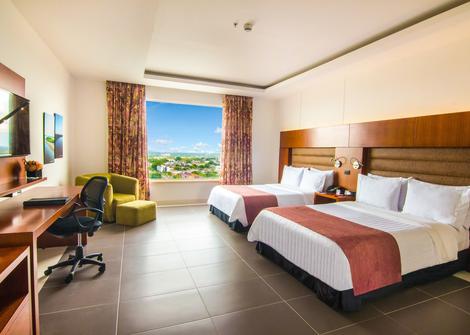 HABITACIÓN TWIN - 2 CAMAS DOBLES GHL Hotel Grand Villavicencio Villavicencio HABITACIÓN TWIN - 2 CAMAS DOBLES GHL Hotel Grand Villavicencio Villavicencio