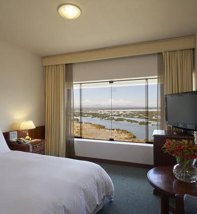 Habitación premium king con vista al lago ghl hotel lago titicaca puno Habitación premium king con vista al lago ghl hotel lago titicaca puno