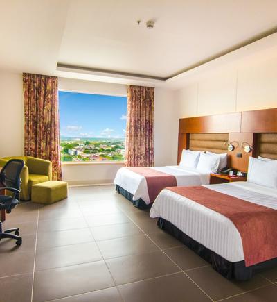 Habitación twin - 2 camas dobles ghl hotel grand villavicencio Habitación twin - 2 camas dobles ghl hotel grand villavicencio