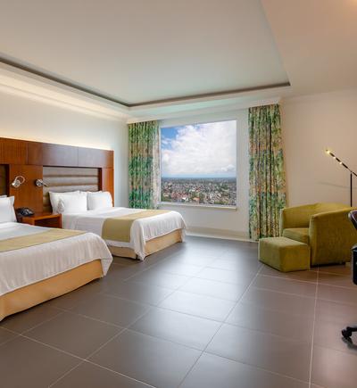 Habitación twin - 2 camas dobles GHl Grand Villavicencio Habitación twin - 2 camas dobles GHl Grand Villavicencio