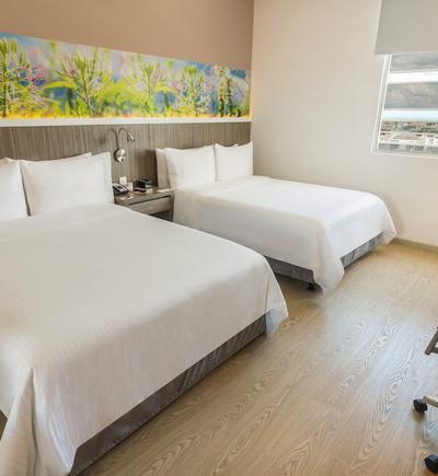Habitación twin - 2 camas dobles GHL Style Yopal Habitación twin - 2 camas dobles GHL Style Yopal