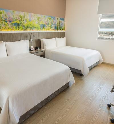 Habitación twin - 2 camas dobles GHL Style Yopal Habitación twin - 2 camas dobles GHL Style Yopal